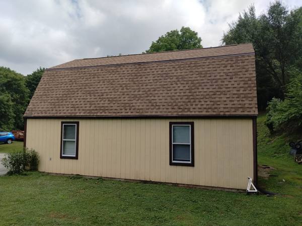 Shingle roof on a gambrel barn